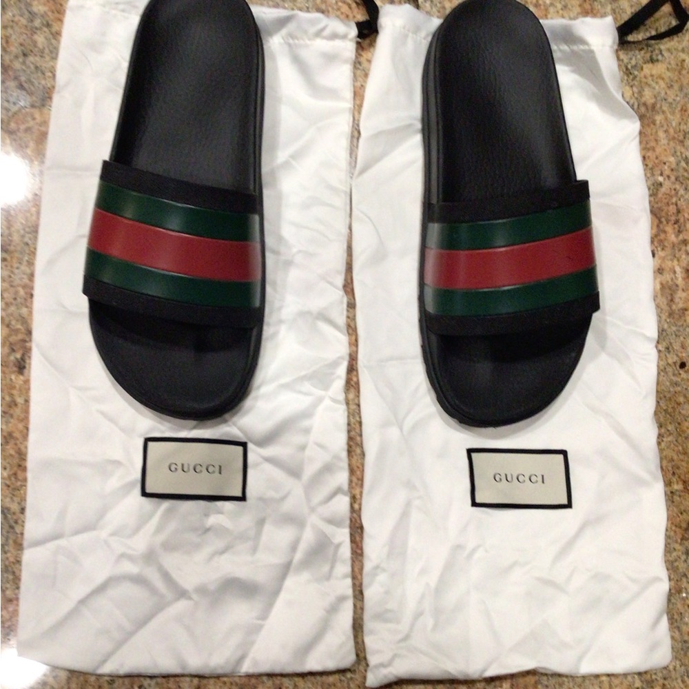 Gucci Black slides. Never worn. Men’s size 11